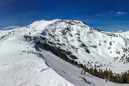 snow-covered mountain under blue sky thumbnail
