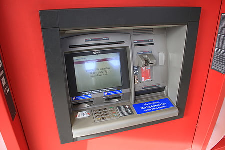 grey and red ATM machine turned-on thumbnail