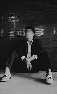 man sitting on floor thumbnail
