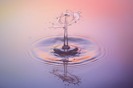 spill water in close-up photography thumbnail