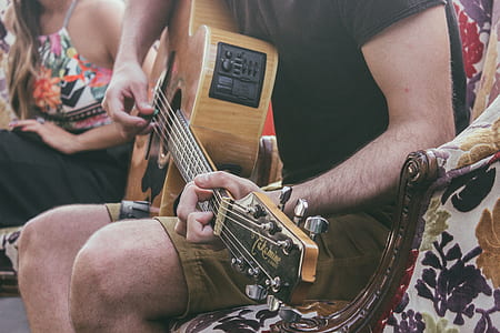 man playing acoustic guitar thumbnail