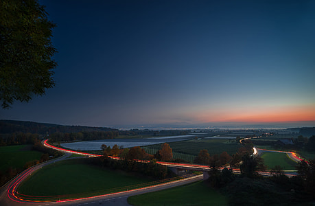 high angle photograph of road during sunset thumbnail