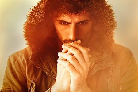 man wearing black parka jacket thumbnail