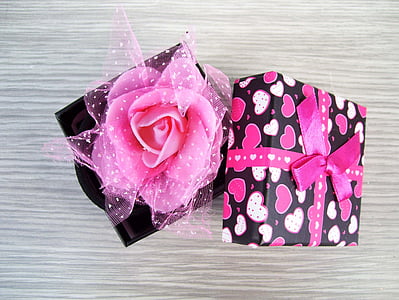 pink heart box on brown table top thumbnail
