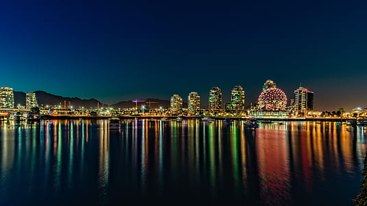 high-rise building with reflection on water thumbnail