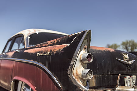 closed-up photo of classic black Chevrolet sedan thumbnail