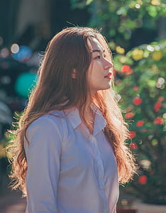 Woman in White Collared Button-up Long-sleeved Shirt thumbnail