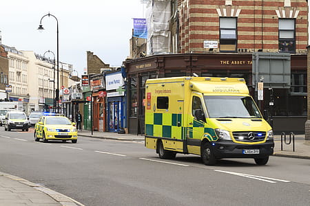 LONDON - AUGUST 21, 2017 Emergency Ambulance speeds along a street in London in response to an emergency call. thumbnail