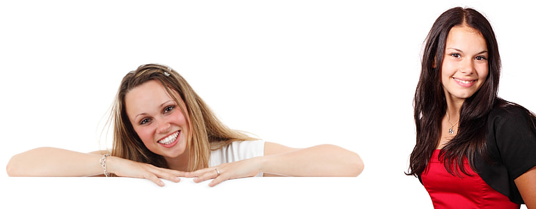two ladies smiling with white background thumbnail