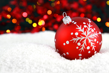 selective photo of red and white Christmas bauble thumbnail
