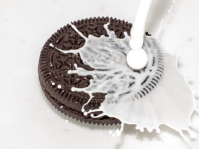 milk poured on Oreo cookie thumbnail