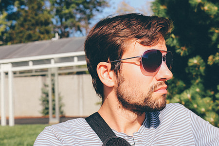 man wearing sunglasses outdoor during daytime thumbnail