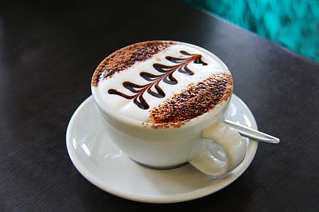 white ceramic teacup on saucer thumbnail