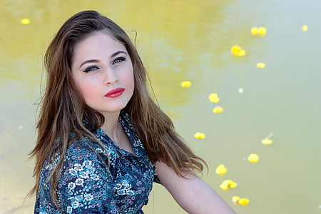woman wearing blue top thumbnail