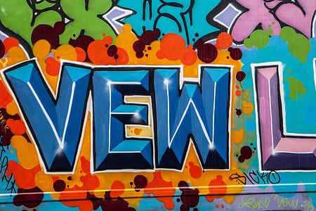 Close up shot of brightly coloured graffiti on the streets of Brooklyn, New York City thumbnail