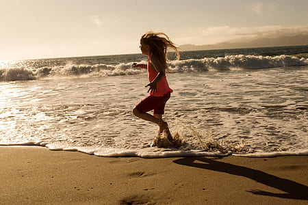 girl standing on sea shore thumbnail