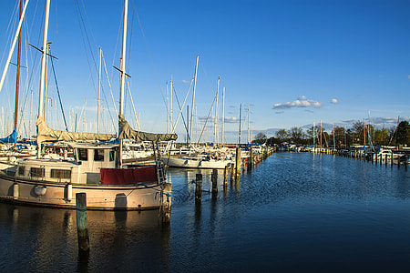 boats on body of water at daytime thumbnail