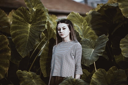woman wearing white striped long-sleeved top thumbnail