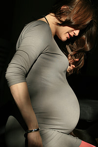 pregnant woman in gray shirt thumbnail