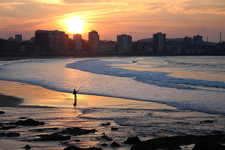 silhouette of person near body of water thumbnail