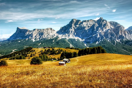 two houses near mountain thumbnail