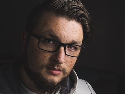 man wearing gray top and eyeglass thumbnail