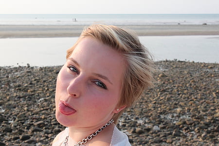 woman showing her tongue thumbnail