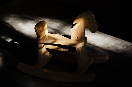brown wooden riding horse toy thumbnail