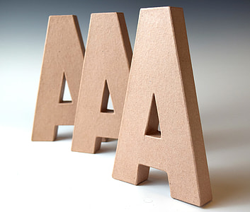 three A brown cardboard letters thumbnail