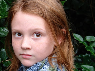 girl near green leaf tree portrait photo thumbnail