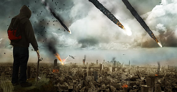 man standing on cliff facing meteors about to hit surface of planet digital wallpaper thumbnail