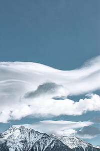 snowy mountain during day time thumbnail