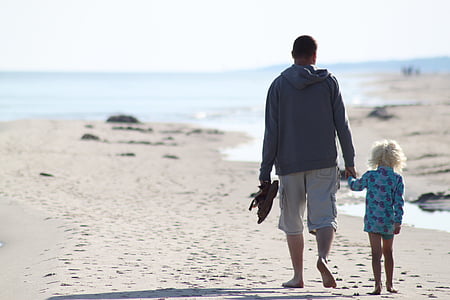 man wearing pullover hoodie walking with girl in blue shirt thumbnail