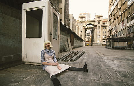 Woman Sitting on Road thumbnail