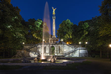 fountain near green leafed trees thumbnail