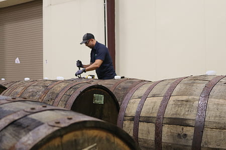 Man Fixing Barrel thumbnail