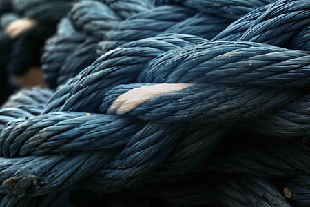 closeup photo of blue tied rope thumbnail