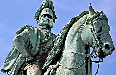 low-angle photography of man riding horse statue thumbnail