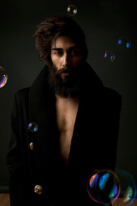 man wearing black coat thumbnail