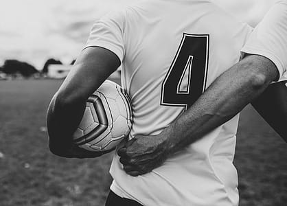 Man Holding Soccer Ball thumbnail