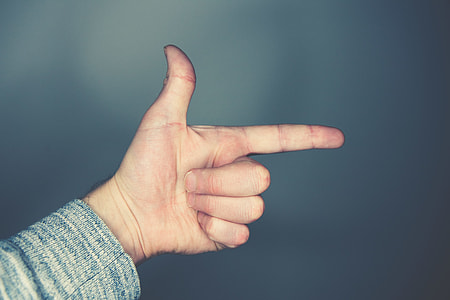 person showing arrow right hand sign thumbnail