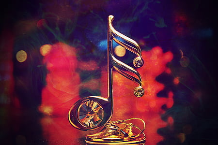gold-colored music note emblem \ thumbnail