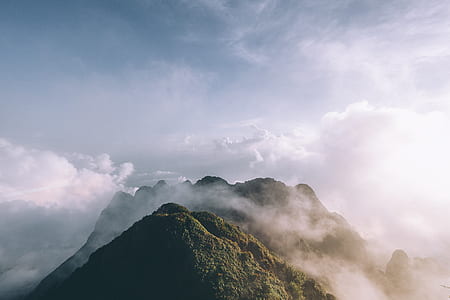 mountain under white clouds thumbnail
