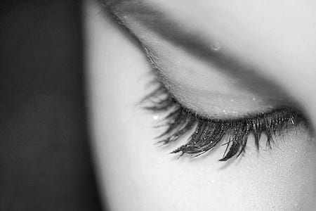 grayscale photography of person's eyelashes thumbnail