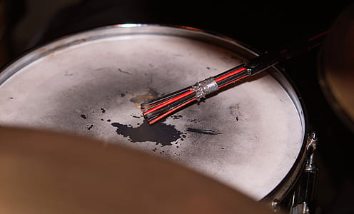 silver and white drum thumbnail