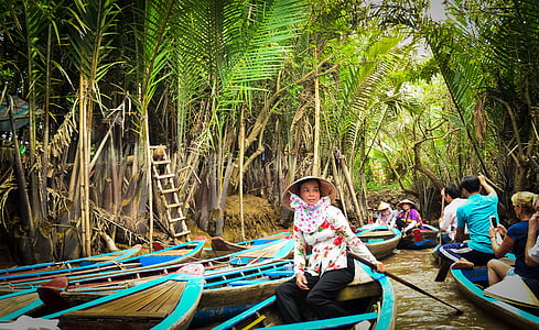 people riding boat on river thumbnail
