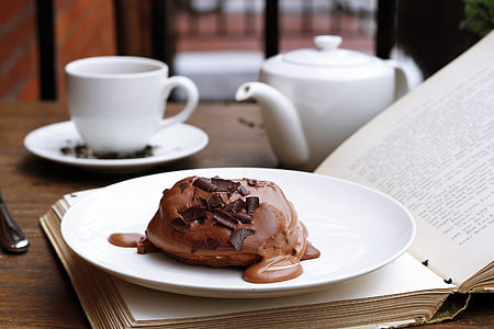 photo of chocolate pastry in serving plate on book thumbnail