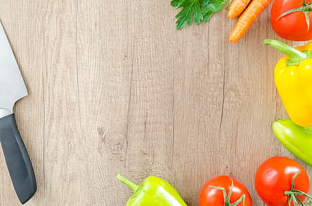 top view photography of variety of vegetables on brown wooden surface thumbnail
