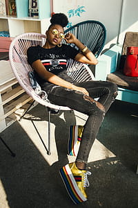 Photo of Woman Sitting on Chair thumbnail