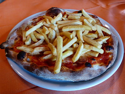 fried fries in white ceramic plate thumbnail
